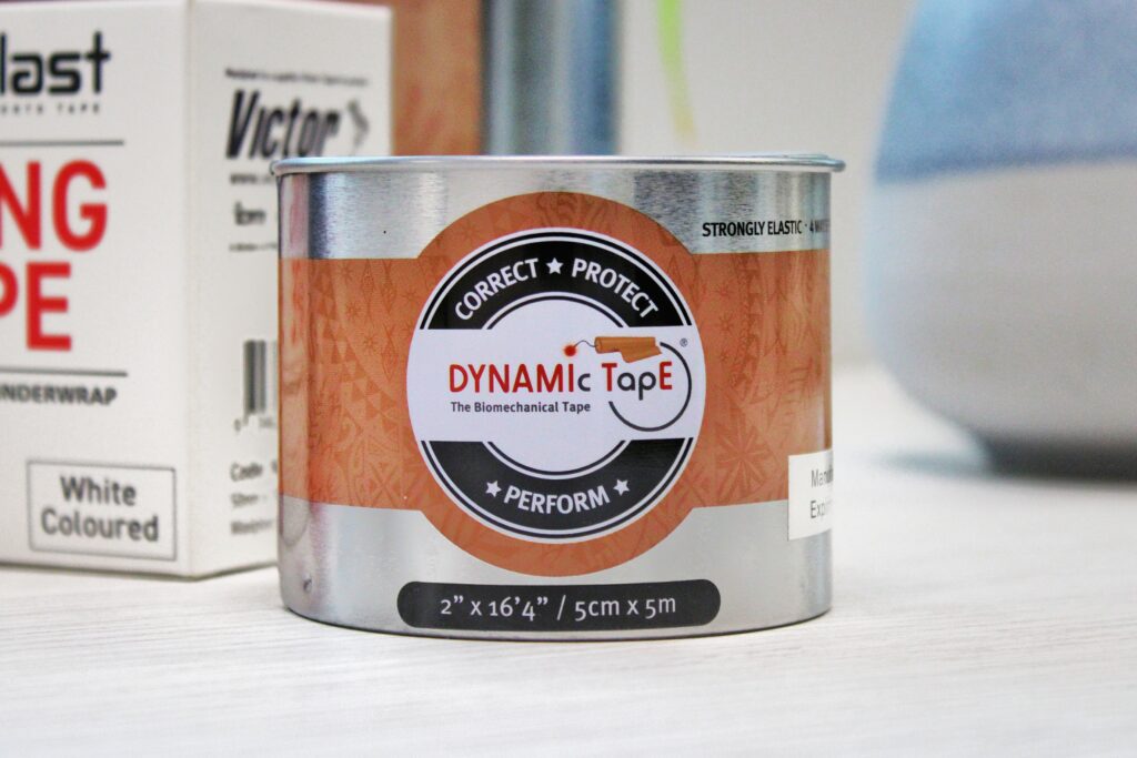 Close-up of Dynamic Tape canister labelled “The Biomechanical Tape