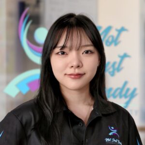 Leia, a light skinned east Asian woman with long black hair.